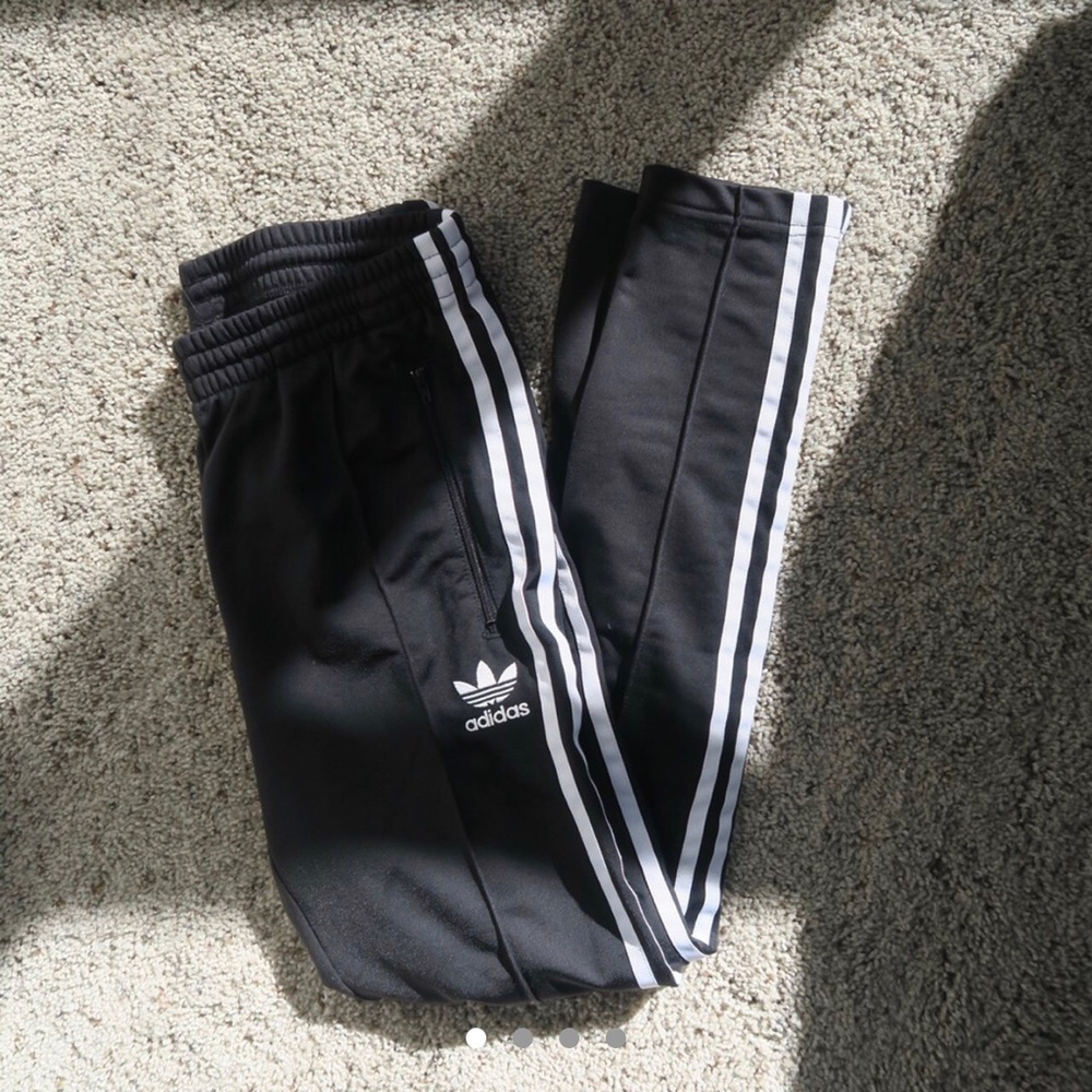ADIDAS ORIGINALS SST TRACK PANTS.